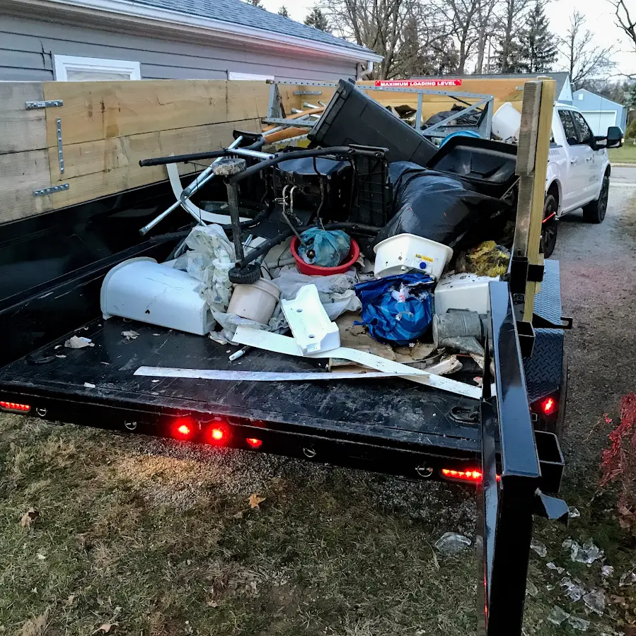 Roll-off dumpster delivered to a residential driveway in Wedgefield